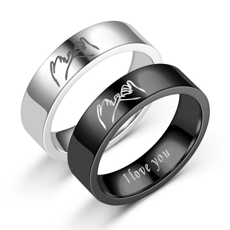 two wedding bands with the words love and hope engraved on them, both in black and white