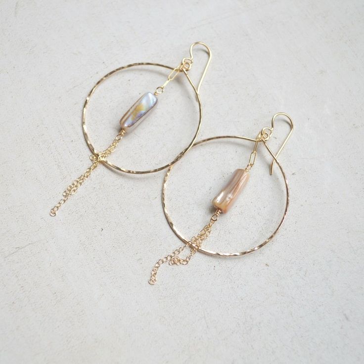 Gold Brass Hoop Earrings With Pearl Drop, Gold Hoop Earrings With Pearl Drop In Brass, Bohemian Gold Mother Of Pearl Earrings, Gold Hoop Pearl Earrings Nickel Free, Gold Adjustable Small Hoop Pearl Earrings, Gold Wire Wrapped 14k Gold Filled Pearl Earrings, Gold Mother Of Pearl Dangle Pearl Earrings, Gold Dangle Pearl Earrings With Mother Of Pearl, Gold Wire Wrapped Pearl Hoop Earrings