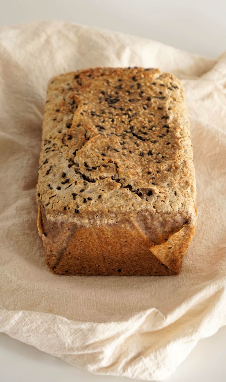 a loaf of bread sitting on top of a piece of paper