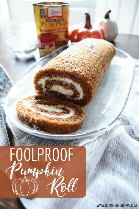 a pumpkin roll is cut in half on a plate with the words fool proof pumpkin roll