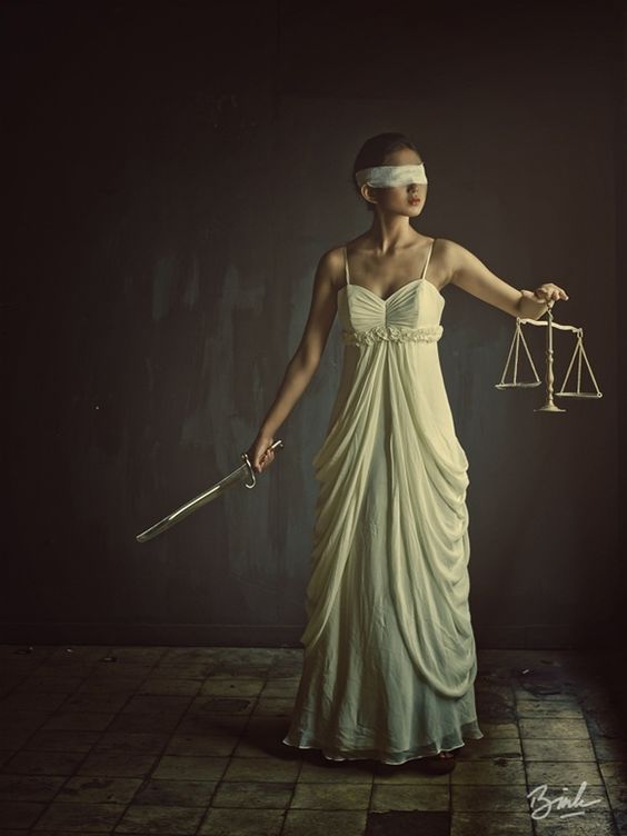 The Greek Goddess Nemesis, working with Nemesis goddess, working with deities in witchcraft, witchcraft for beginners, deity work in witchcraft, and more Greek Goddess Nemesis, Goddess Of Vengeance, Goddess Nemesis, Nemesis Goddess, Lady Of Justice, Goddess Of Justice, Lady Justice, Red Dress Women, Human Art