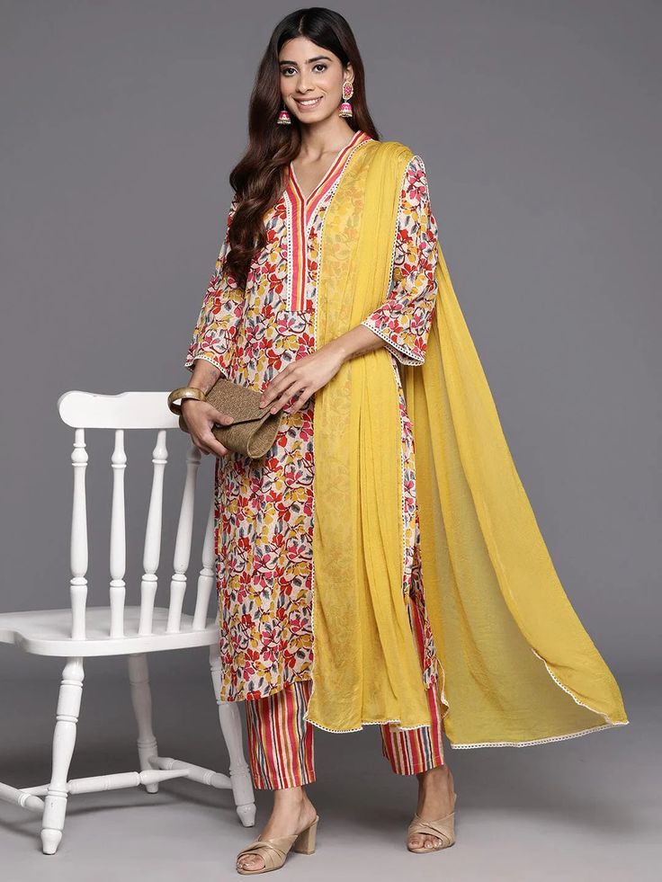 Grab this beautiful 3-piece set. The set comes with floral print & embroidered kurta has v neck, 3/4th sleeves & calf length teamed with printed trouser pant and a dupatta. Color - Multi Color Kurta Fabric-Cotton Bottom Fabric-Cotton Dupatta Fabric - Cotton Neck-V Neck Sleeves-3/4th Puff Sleeves Work - Print & Embroidery Detailing Washing Instructions-Hand Wash DISCLAIMER - The color of the product may be differ due to screen settings of device. A misprint here and a color drop slip there is the Embroidered Suit, Formal Jewelry, Print Embroidery, Embroidery Detailing, Cotton Dupatta, Cotton Bottoms, Churidar, Suit Set, Embroidery Details