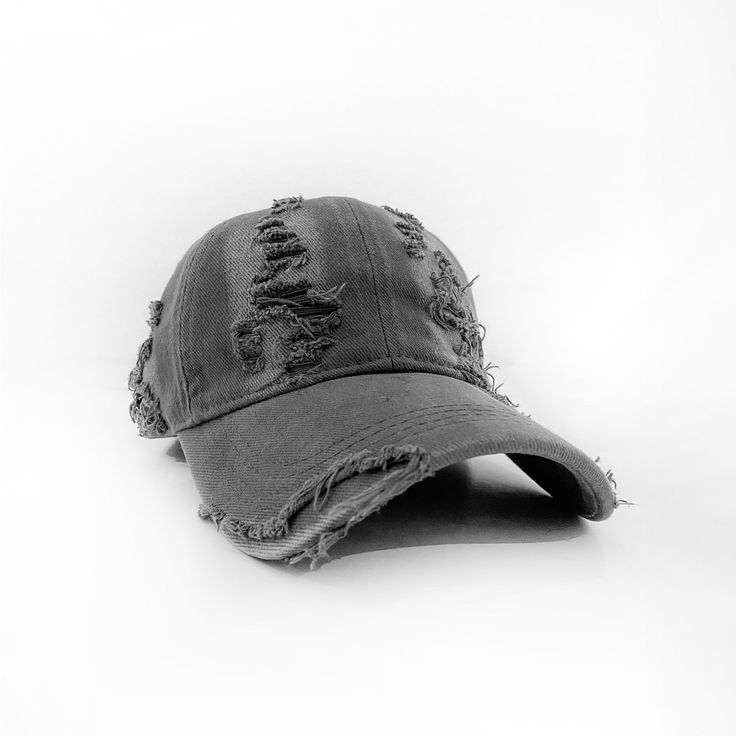 The Distressed Hat, is a fusion of contemporary style and vintage charm. Available in two captivating colors, Black and Rust, this hat effortlessly combines edginess with a touch of nostalgia. Crafted from high-quality cotton, the Distressed Hat ensures comfort and durability. The vintage wash adds a unique character to each hat, giving it a worn-in look.Elevate your style game and add a touch of rugged sophistication to your wardrobe. Made to Order. One Size Fits All. Casual Washed Black Distressed Hat, Black Distressed Hat One Size, Adjustable Distressed Washed Black Hat, Distressed Washed Black Cotton Hat, Vintage Black Distressed Hat, Denim Cargo Pants, Distressed Hat, Sweaters Knitwear, Instagram Shop