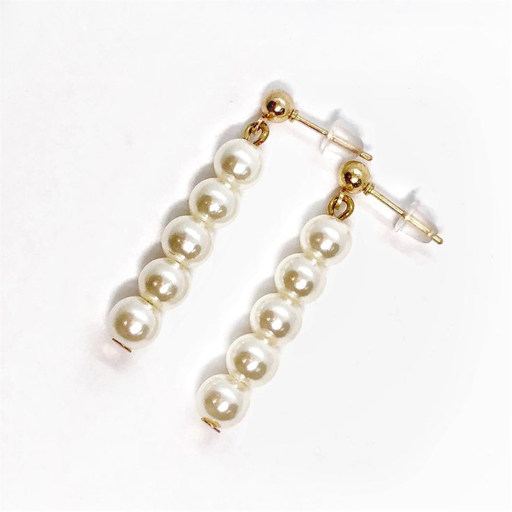 Material: Gold plating over alloy Stone: Pearl bead Size: 34mm Come with a gift box Reg: $29.99 Elegant Hypoallergenic Alloy Earrings, Elegant Alloy Earrings As Gift, Elegant Alloy Earrings For Gift, Elegant Hypoallergenic Alloy Jewelry, Classic Metal Jewelry With Pearl Drop, Gold Beaded Earrings With Pearl Drop For Gifts, Elegant Beaded Earrings With Pearl Charm For Gift, Metal Pearl Drop Jewelry For Gifts, Gold Pearl Drop Beaded Earrings For Gift