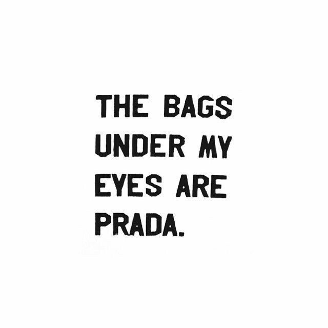 the bags under my eyes are prada written in black ink on a white background