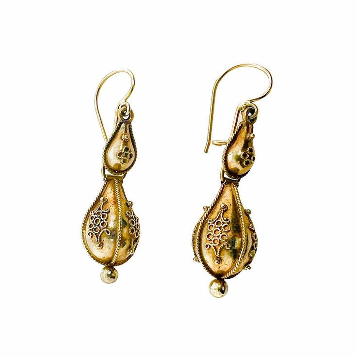 This is part of Chairish’s Fine Jewelry assortment.  A fine Victorian period pair of 14K gold earrings with French wires and hooks for pierced ears. The earrings have Etruscan beadwork applied to both the top and the bottom drop. They are not marked, but test 14K. Condition is excellent.  Dimensions: Length to top of wire: 1 1/2", Diameter: 1/2", Weight: 3.9 grams Antique 14k Gold Hallmarked Earrings, Traditional 14k Gold Drop Earrings, Vintage Ceremonial Drop Earrings, Vintage Drop Earrings For Ceremonial Occasion, Victorian Hallmarked 14k Gold Earrings, Antique Yellow Gold Ceremonial Earrings, Victorian Style Ceremonial Earrings For Pierced Ears, Antique Ceremonial Dangle Earrings, Antique Dangle Earrings For Ceremonies