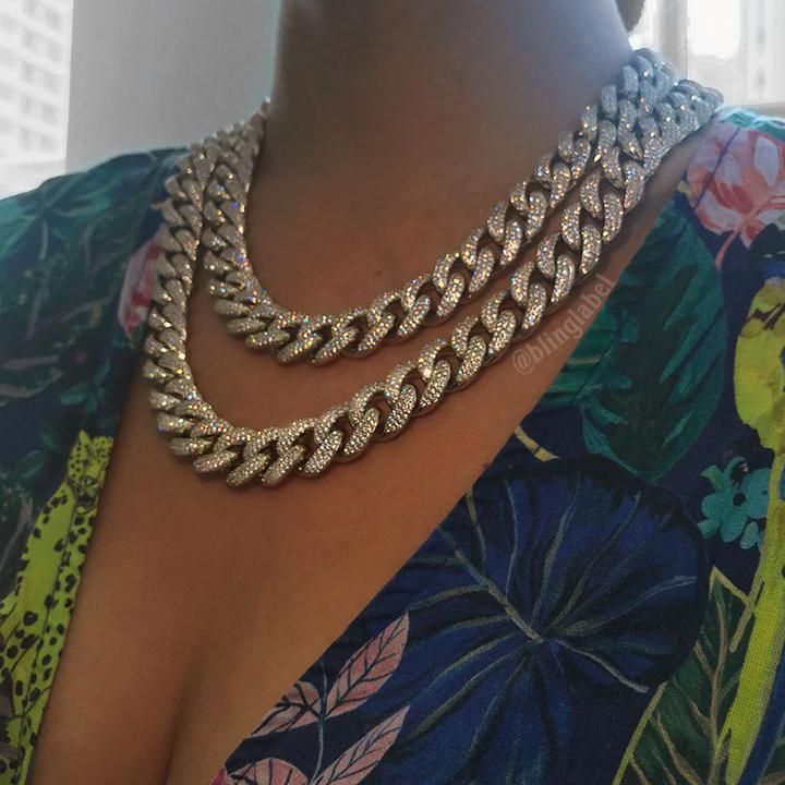 This miami cuban link chain is fully iced out.Utilizing the latest 18K plating technology available, the end result is more durable finish and color that performs better than any other finish in the market. Overall, this cuban link chain helps you to achieve the feel, look and weight of a real iced out cuban link chain Silver Cuban Link Chain Necklace Iced Out, Silver Cuban Link Necklace With Bling, Cuban Link Diamond Necklace For Streetwear, Diamond Cuban Link Necklace For Streetwear, Silver Cuban Link Iced Necklace, Silver Iced Cuban Link Necklace, Iced Silver Cuban Link Necklace, Iced Out Crystal Cuban Link Necklace, Iced Out Cuban Link Crystal Necklace