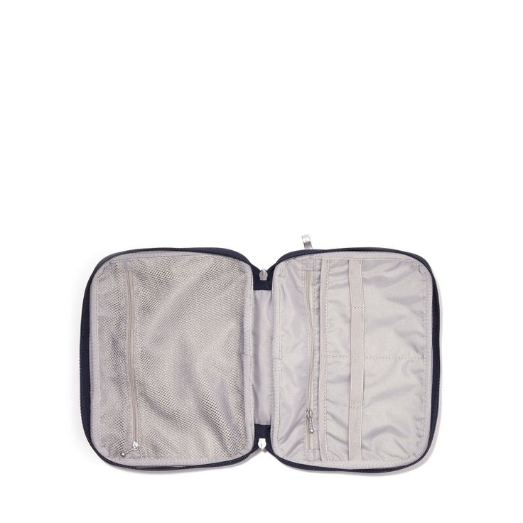 With easy-to-organize mesh pockets and convenient elastic straps to keep your essentials secure, this accessory case is a must for staying organized on your next trip — or just around the house. Exterior dimensions: 9.25"w x 6.75"h x 1.75"d. Functional Travel Cosmetic Bag Portable, Functional Portable Travel Cosmetic Bag, Functional Portable Cosmetic Bag For Travel, Portable Travel Cosmetic Bag, Functional Cosmetic Bag For Organization, Functional Zipper Pouch Travel Accessories, Functional Travel Accessories With Zipper Pouch, Functional Travel Accessories Zipper Pouch, Multifunctional Zipper Pouch Travel Accessories