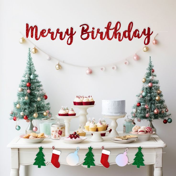 a table topped with cakes and cupcakes next to a merry birthday wall sign