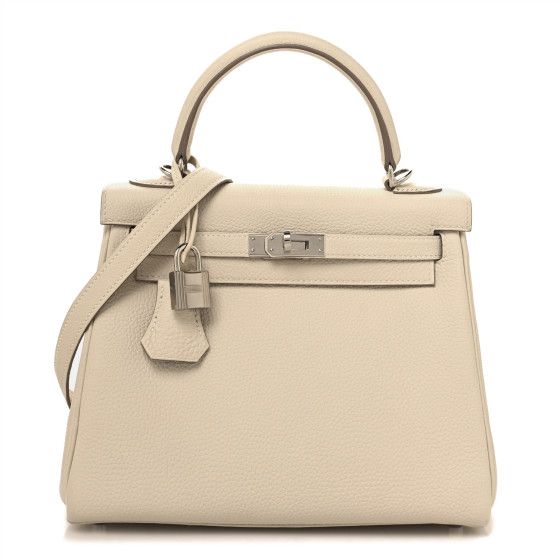 This is an authentic HERMES Togo Kelly Retourne 25 in Craie. This iconic handbag is expertly handcrafted of grained calfskin leather in off white. The bag features rolled leather top handles, a short front flap with a strap closure, and palladium plated hardware including a padlock and keys. The top flap opens to a matching goatskin leather interior with zipper and patch pockets. Cream Bag With Palladium Hardware And Double Handle, Cream Double Handle Bag With Palladium Hardware, White Timeless Epsom Leather Bag, Timeless White Epsom Leather Bag, Cream Top Handle Bag With Palladium Hardware, White Epsom Leather Bag With Palladium Hardware, Formal Cream Epsom Leather Bags, Timeless Beige Bag With Silver-tone Hardware, Cream Epsom Leather Bag For Everyday Use