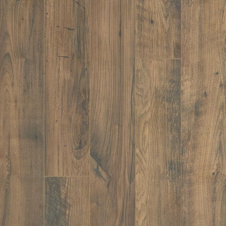 wood flooring that looks like it has been painted in brown and is very rustic