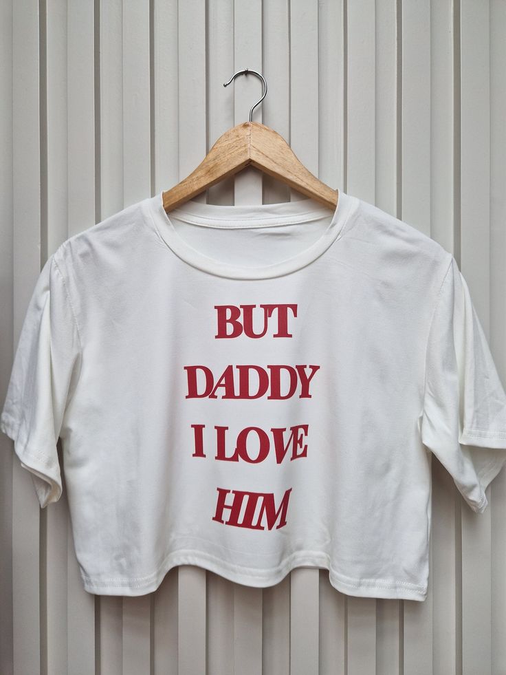 But Daddy I Love Him t-shirt. Perfect for attending the Era's tour or for casual wear. Round Neck Crop Short Sleeves Drop Shoulder Comfy Tee. Summer Band Merch Cropped T-shirt With Graphic Print, Unisex Summer Top With Logo Print, Summer Concert T-shirt With Letter Print, Cotton Band Merch Top With Slogan, Unisex Band Merch Tops With Logo Print, Summer Band Merch Cropped T-shirt With Crew Neck, Band Merch Slogan Tops For Summer, Band Merch Cropped T-shirt For Summer, Summer Band Merch Tops With Slogan