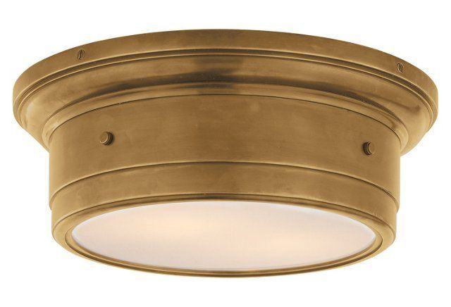 a close up of a light fixture on a white background