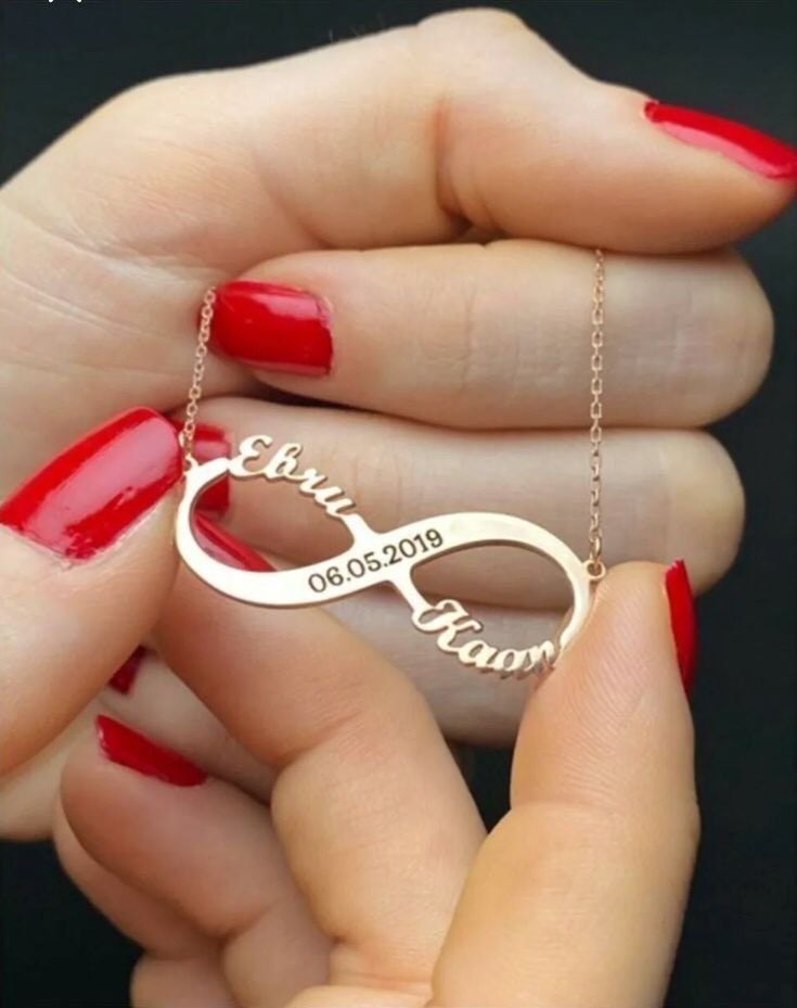 This 14K solid gold infinity name  and date necklace makes for a thoughtful and unique gift for a loved one . Whether you're celebrating a birthday , anniversary or just want to show your love , this neclace is sure to make a lasting impression. *FEATURES We are using real gold in our product for pendant and chain .  Material : 14 K Solid Gold  Colour : yellow gold   Charm dimentions : 3 cm x 1,5cm Chain Length : 14''-20'' upon your request  The open necklace laid straight & measured end to end. Personalized Infinity Rose Gold Jewelry, Personalized Rose Gold Infinity Jewelry, Customizable Infinity Name Necklace For Anniversary, Elegant Rose Gold Name Necklace For Anniversary, Silver Infinity Name Necklace For Anniversary, Infinity Shape Custom Name Necklace For Anniversary, Infinity Name Necklace For Anniversary Gift, Infinity Name Necklace For Anniversary, Infinity Engraved Name Necklace As Gift