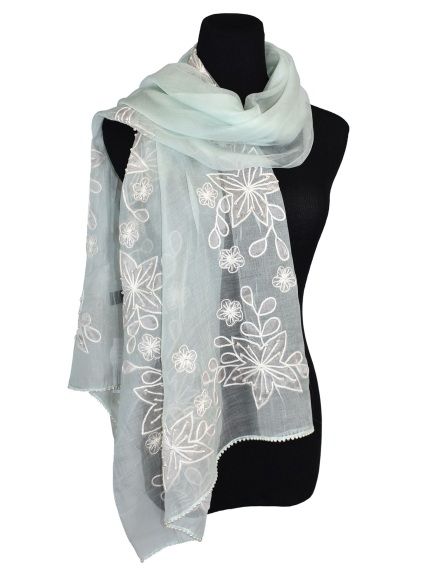 Semi-transparent shawl highlights a hand embroidered floral motif finished with pearl beads. Elegant Embroidered Shawl For Spring, Elegant Embroidered Scarves For Spring, Elegant Embroidered Spring Scarves, Elegant Spring Embroidered Dupatta Fabric, Elegant Spring Dupatta Embroidered Fabric, Intricately Embroidered Summer Dupatta, Traditional Spring Shawl, Elegant Floral Embroidered Shawl For Spring, Elegant Spring Embroidered Organza Fabric