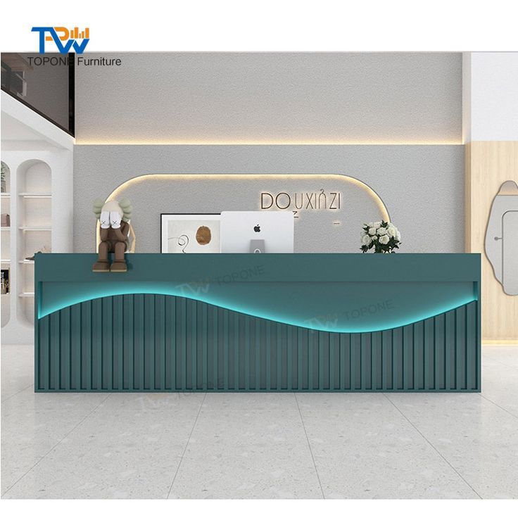 the front desk of a modern office with an illuminated wave design on it's counter