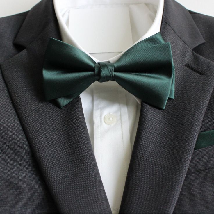 Classy and formal pre-tied and adjustable satin double-deck bow ties for your next formal event. Matches great with suits and tuxedos. Color: Hunter Green Material: Satin Polyester Adult Pre-Tied Bow Tie: approx. 4.75 inch width by 2.5 inch height Necksize 11.5 inches - 20 inches Metal clasp for secure and comfortable wear. Matching Pocket Square: approx. 9 inches by 9 inches www.tie-mood.com Bowtie Wedding, Dark Green Wedding, Bow Ties For Men, Wedding Bow Tie, Ties For Men, Pre Tied Bow Tie, Bow Tie Set, Bow Tie Wedding, Style Formal