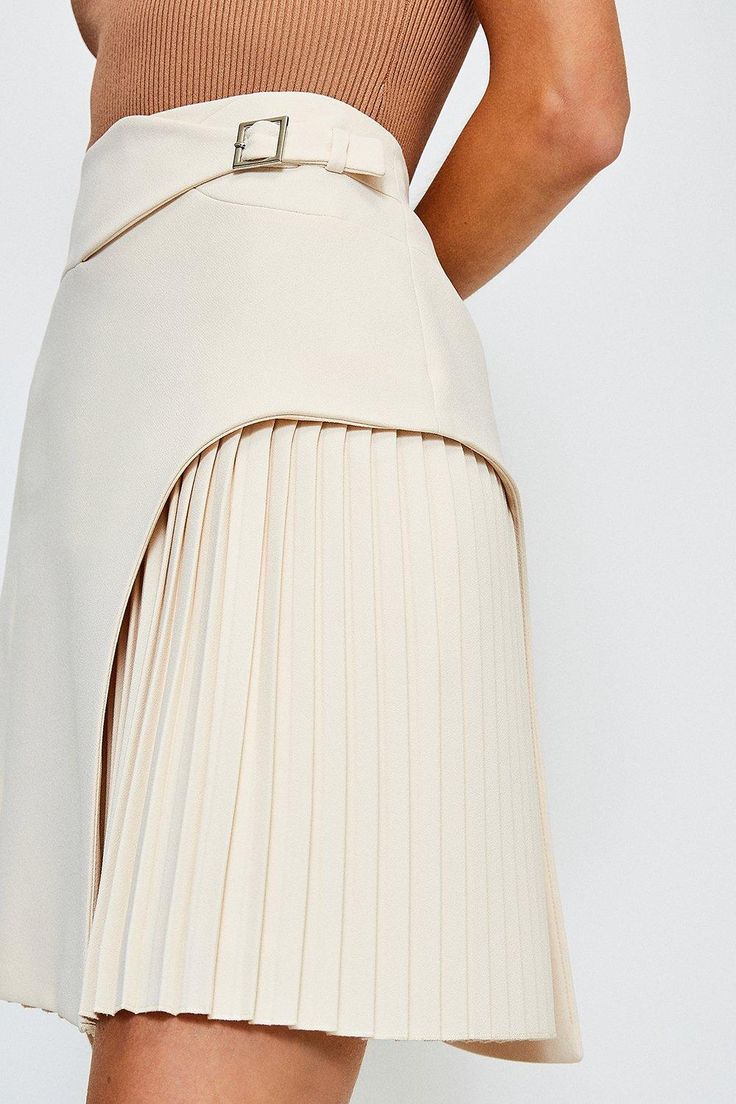 Embrace The New Season'S Nostalgic Mood With The Skirt  Silhouette Of Choice - The Mini Kilt. Taking Style Notes From The Traditional Staple, It'S Designed For A Clean, Modern Look, And Comes With An Asymmetric Wrap-Over Front, Pleated Panels And A Buckle Fastening. Luxury Beige Pleated Skirt With Pleated Hem, Unique Pleated Skirts, Luxury Elastane Mini Skirt, Luxury Pleated Mini Skirt For Office, Luxury Pleated Hem Mini Skirt For Work, Cream Leather A Line Skirt, Luxury Casual Skirt With Pleated Hem, Luxury Mini Length Pleated Skirt With Pleated Hem, Hermes Leather Skirt