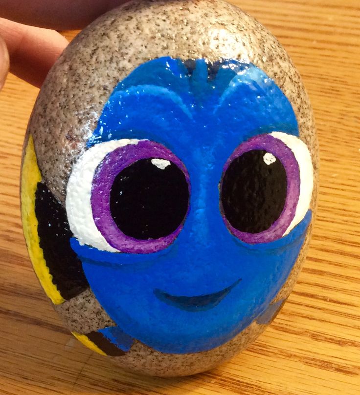 an image of a ball painted to look like a cartoon character with big eyes on it