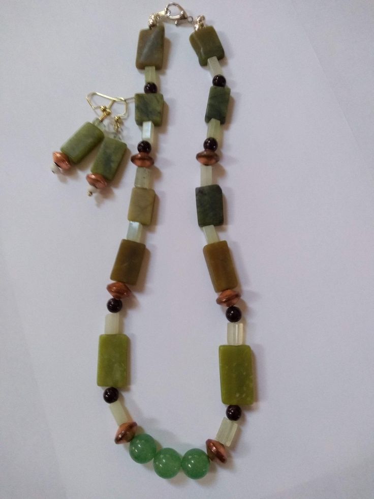 Gorgeous Jade and light Jade, onyx and copper necklace and earring set - Jade is known to bring luck and prosperity and promote a long life! Spiritual Rectangular Jade Jewelry, Brown Jade Jewelry For Healing, Brown Jade Jewelry With Natural Stones, Green Rectangular Gemstone Beads Jewelry, Brown Jade Round Beads Jewelry, Brown Jade Round Bead Jewelry, Artisan Jade Jewelry For Healing, Handmade Brown Jade Jewelry, Earthy Jade Round Beads Jewelry