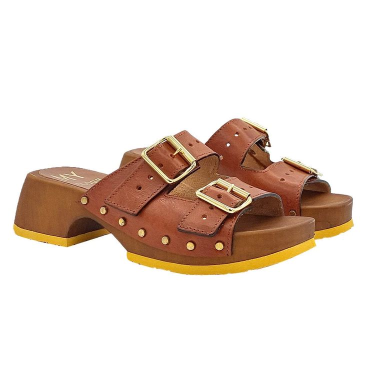 Women's clogs with brown wood effect base Double band in tan leather, with two adjustable straps Open toe 5 cm heel and 3 cm plateau Stable and comfortable made entirely in ITALY. Craftsmanship. BEFORE PURCHASING DO NOT FORGET TO CHECK THE SIZE! Brown Mules With Tang Buckle, Brown Open Toe Clogs With Cork-bed Midsoles, Red Clogs, Clogs And Mules, Women's Clogs, Leather Clogs, Clogs Shoes, Womens Clogs, Brown Wood