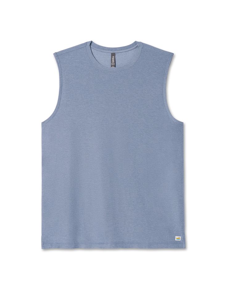 The softest piece of workout gear on the planet gets a new life in this breezy muscle tank. Fully functional and endlessly comfortable, you'll wear this tank all summer long. | Vuori Strato Muscle T-Shirt / Tee | Chambray Heather | XL Vuori makes premium performance apparel inspired by the active Coastal California lifestyle; an integration of fitness, surf, sport, and art. Breaking down the boundaries of traditional activewear, we are a new perspective on performance apparel. Summer Athleisure T-shirt For Gym, Athleisure Cotton Tank T-shirt, Cotton Tank T-shirt For Athleisure, Casual Summer Gym Tank Top, Versatile Go-dry Tank Top, Cotton Gym Top For Summer, Summer Gym Cotton Top, Casual Moisture-wicking Tank Top With Dropped Armholes, Cotton Top For Gym In Summer