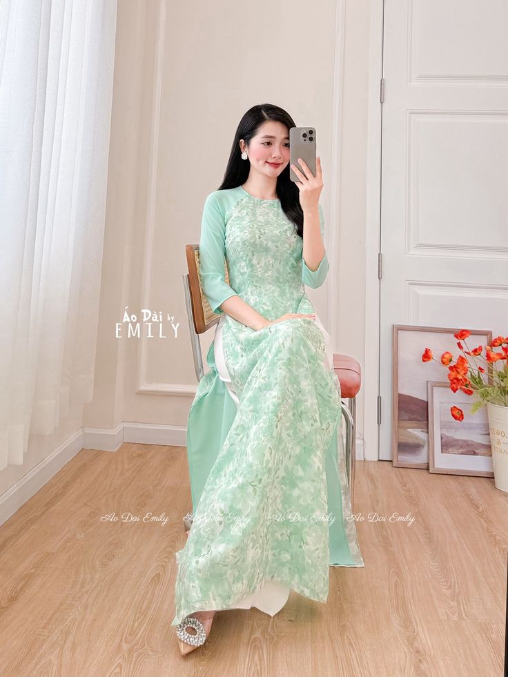 🌻This Set includes 1 long dress 🌻Material: Voan silk , double layers      Stretchy level: 1/10 🌻 The measurement of this ao dai (long dress) is in Vietnamese size (American size tends to be bigger for the same size). Please LOOK AT THE SIZE CHART CAREFULLY BEFORE ORDERING. There might have some chalk writings on the fabric due to making process. These marks can be washed away easily. 🌻🌻No returns or exchanges Buyer can contact seller about any issues with an order. 🌸 Follow us Facebook/aodaiemily www.aodaiemily.com 💜 Thank you very much!💜 Green Floor-length Sets For Spring, Green Floor-length Spring Sets, Traditional Summer Ao Dai For Weddings, Elegant Green Ao Dai For Summer, Traditional Ao Dai For Summer Wedding, Traditional Summer Wedding Ao Dai, Green Spring Wedding Cheongsam, Spring Wedding Green Cheongsam, Fitted Long Sleeve Cheongsam For Summer