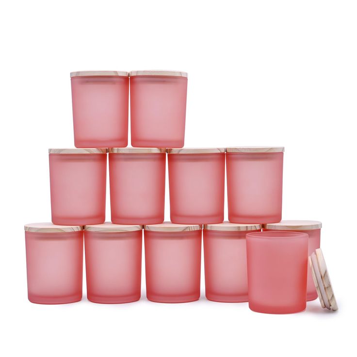 a stack of pink candles sitting next to each other