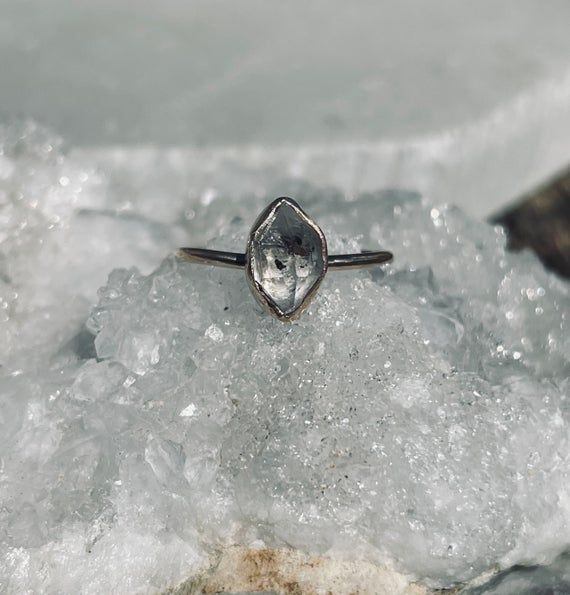 The herkimer diamond are roughly 7-8mm All options other than copper are in bezel setting and will not turn your skin colors (unless you have skin allergies to those metals of course) WHAT IS GOLD FILL? It’s an actual layer of gold-pressure bonded to another metal. Gold filled is not to be confused with gold plating as filled literally has 100% more gold than gold plating. Gold filled is much more valuable and tarnish resistant. It is also safe for those with sensitive skin to wear. It can last Round Cut Jewelry With Si Clarity For Anniversary, Anniversary Jewelry With Si Clarity And Round Cut, Minimalist Si Clarity Diamond Wedding Ring, Si Clarity Diamond Rings For Wedding, Minimalist 14k White Gold Diamond-cut Jewelry, Minimalist Diamond Ring With Si Clarity, Sterling Silver Diamond Cut Topaz Ring For Promise, Sterling Silver Diamond Cut Topaz Promise Ring, Silver Diamond Ring With Si Clarity