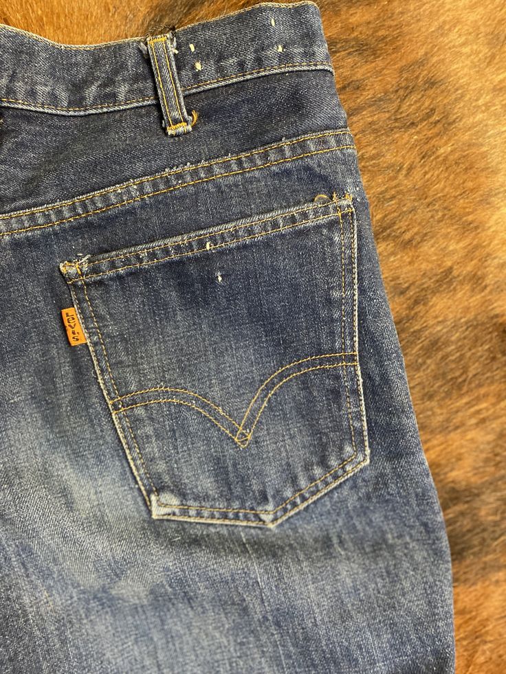 waist: 30" inseam: 32.5" Pre-washed 100% cotton orange tab, super rare! when shopping vintage denim, we recommend sizing up 2-3 sizes To find your vintage waist size take a pair of pants or shorts you already own and measure the waist straight across then double that number. If you measure 14” across, your vintage waist size will be 28”. This is how we come up with the waist measurements since the labeled size on vintage/pre-washed denim is rarely accurate. DM or email us for any questions or he Classic Dark Wash Pre-washed Bottoms, Medium Wash Pre-washed Cotton Bottoms, Faded Cotton Jeans With Belt Loops, Faded Cotton Jeans, Vintage Cotton Bottoms In Medium Wash, Vintage Medium Wash Cotton Bottoms, Vintage Cotton Bottoms In Dark Wash, Vintage Medium Wash Bottoms With Hip Pockets, Vintage Washed Denim Blue Bottoms