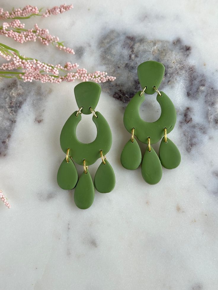 Green earrings Green Dangle Chandelier Earrings, Chic Green Earrings For Gift, Chic Green Earrings, Modern Green Drop Earrings, Modern Green Dangle Earrings, Modern Green Dangle Jewelry, Elegant Lime Green Dangle Earrings, Trendy Green Dangle Jewelry, Trendy Green Drop Earrings