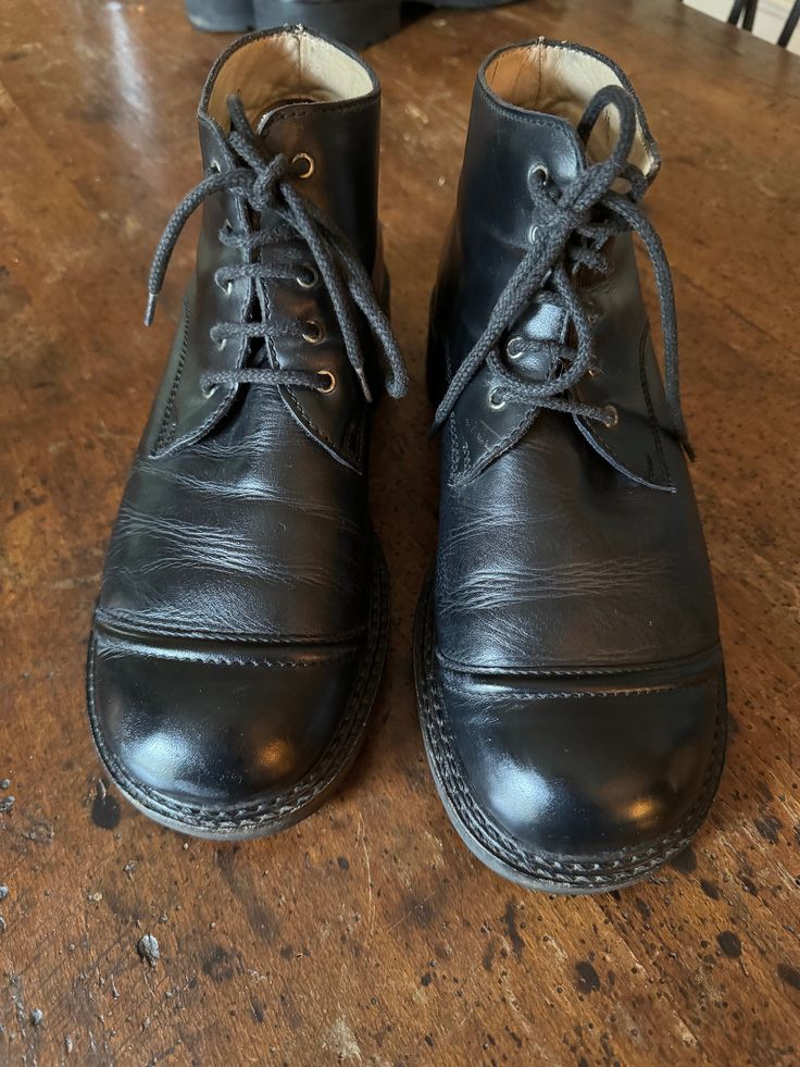 Beautiful, classic low Giraudon boots. Size 40, made in Portugal. These boots are so well made, leather inside and out. These have some attitude, great with black tights but also with stripes and colors or worn with jeans. This is a wonderful brand that is no longer made so these are special. If you like this brand I will be listing three other pair. I would say these will not fit a narrow foot. Vintage Black Chelsea Boots With Round Toe, Vintage Black Leather Chelsea Boots, Classic Ankle-high Goodyear Welted Boots, Classic Ankle-high Boots With Goodyear Welt, Classic Combat Boots With Vibram Sole For Winter, Classic Ankle-high Moto Boots With Rubber Sole, Classic Ankle-high Moto Boots For Winter, Classic Fall Boots With Vibram Sole, Classic Ankle-high Moto Boots With Leather Sole