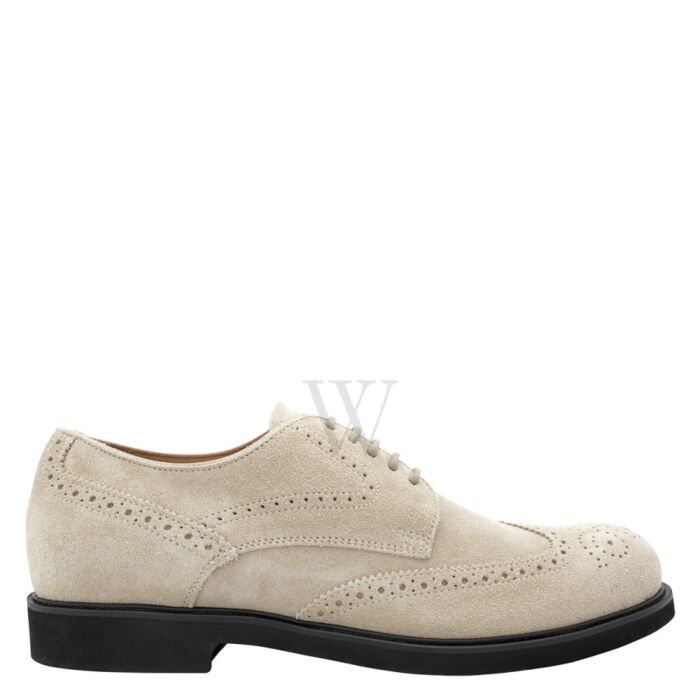 Tods Men's Oxfords & Derbys. SKU: XXM93B00C1ZHG0C005. Color: Rock. Shoe Style: Derby. Vamp Style: Lace-up. Upper Material: Leather. SoleMaterial: Rubber. Tods Men's Wing-Tip Perforations Leather Lace-Up Derby Shoes. Lace ups in elegant smooth leather with English style wing-tip perforations, stamped monogram and a rubber outsole with embossed rubber pebbles. Please Note: Tod's shoes may or may not come in a dust bag. Made in Italy. Please visit the brand website for sizing information. Vamp Style, Tod's Shoes, Tods Shoes, Brand Website, Versace Watch, Cheap Gifts, English Style, Denim Shoes, Crossbody Messenger Bag