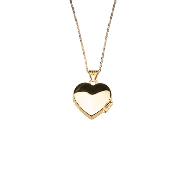 14k Heart Locket Necklace. Carry memories close with our 14k yellow gold heart locket that opens with a snap clasp to present two photos. Suspended from our signature 14k cable chain necklace, this beautiful heart locket can be engraved on the front for a personalized gift. We recommend 1 - 3 letters. Design your own engraving! Tap the button above to explore your own unique engraving options. Material: 14k Solid Gold. Dimensions: 20mm x 15mm Chain: 14k Cable Chain 14k Gold Heart Pendant Locket For Anniversary, Yellow Gold Oval Jewelry With Heart Charm, 14k Gold Heart Pendant Keepsake Jewelry, Valentine's Day 14k Gold Locket Jewelry, 14k Gold Heart-shaped Locket, 14k Gold Heart Locket Jewelry, Heart-shaped 14k Gold Locket, 14k Gold Locket Jewelry For Valentine's Day, Classic Locket Jewelry For Valentine's Day