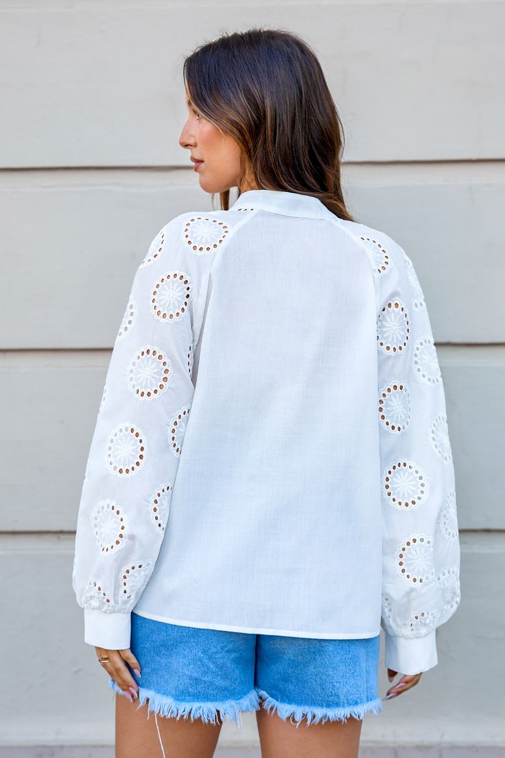 The White Button-Up Eyelet Puff Sleeve Blouse delivers with charming eyelet details and statement puff sleeves. It’s your new go-to for adding a touch of whimsy to any outfit—perfect for turning ordinary into extraordinary! Product code: CAA04B4G021CC Features:  Woven Standing collar with V-neck Eyelet puff sleeves Front buttons Pattern: Faux Texture Wash Method: Regular Wash Material: 100%POLYESTER. Spring Bishop Sleeve Tops With Button Closure, Spring Tops With Bishop Sleeves And Button Closure, Spring Button-up Puff Sleeve Top, Spring Bishop Sleeve Blouse With Button Closure, Spring Bishop Sleeve Blouse With Button Cuffs, Spring Blouse With Bishop Sleeves And Button Closure, Bishop Sleeve Tops With Buttons For Summer, White Puff Sleeve Blouse With Button Cuffs, Spring Button-up Puff Sleeve Top With Buttons