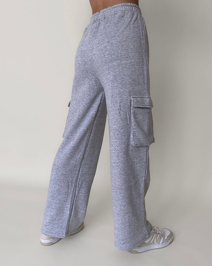 Stay fashionably comfortable with our fleece cargo pocket straight leg sweat pants. Cozy brushed fleece, cargo pockets, and an adjustable drawstring combine style and function effortlessly. A must-have for your wardrobe! More Details: - Fits true to size for most - Does stretch - 60% COTTON 40% POLYESTER - Color may vary due to the lighting - Model is wearing a size small *If you are taller than 5'7, they may fit short. Model Details Height 5'5 | Chest 32" Cup size A | Waist 25" Hips 35.5" | Wei Sweat Cargo Pants, Cargo Sweats, Rave Fits, Xmas List, Cargo Pocket, Fleece Pants, Sweat Pants, Winter Clothes, Cup Size