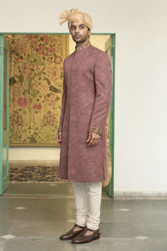 Blush pink sherwani with all over woven paisley patterns and sequin embellishments. Comes with inner kurta and churidar. - Aza Fashions Pink Sherwani With Chikankari Embroidery For Reception, Fitted Pink Sherwani With Pallu, Designer Pink Sherwani With Pallu, Pink Sherwani With Zari Work For Reception, Traditional Pink Bandhgala With Zari Work, Pink Straight Kurta For Formal Occasions, Pink Bandhgala With Zari Work For Eid, Traditional Pink Bandhgala For Designer Wear, Elegant Pink Sherwani With Dabka Detailing