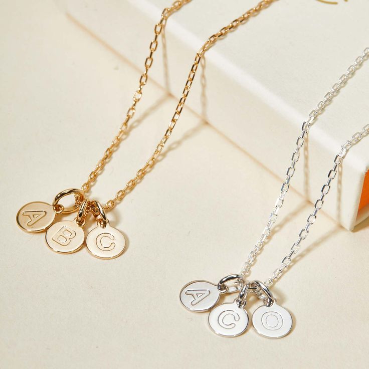 An imprint on your heart and on your jewelry, our Personalized Letter Pendant Necklace is the perfect way to treasure the love of your little ones. Choose up to 5 letter pendants to represent your children's initials, hand-engraved with their names or date of birth on the reverse.18K Champagne Gold Plated or 925 Sterling SilverLetter charm: 0.3Secure clasp fasteningCharms are removable from this chain and can be worn on all Merci Maman chain lengthsHand-engraved in our Paris WorkshopSent with lo Sterling Silver Name Necklace With Charms For Mom, Minimalist Personalized Sterling Silver Charms, Personalized Minimalist Sterling Silver Charms, Personalized Initial Pendant Charm Necklace In Sterling Silver, Personalized Sterling Silver Initial Pendant Charm Necklaces, Personalized Sterling Silver Initial Pendant Charm Necklace, Sterling Silver Initials Charm Necklace For Birthday, Sterling Silver Initials Charm Necklace For Birthdays, Classic Personalized Charms For Anniversary