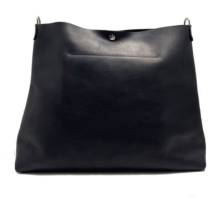 The Bell Shoulder Bag in Black Dark and dazzling, this bag features a bell-shaped body made from the finest oil-tanned, full-grain leather, a large interior and exterior pocket. This bag also features a gorgeous, wide strap that fits comfortably on your shoulder. Handcrafted in our North Carolina workshop of the finest full-grain leather, our totes are durable, as they are beautiful and unique. We’ve designed them for easy access & retrieval of your items. Our totes are the perfect accessory to Smooth Grain Crossbody Bag For Shopping, Black Smooth Grain Crossbody Shoulder Bag, Black Smooth Grain Bucket Shoulder Bag, Black Satchel Shoulder Bag With Smooth Grain, Black Smooth Grain Satchel Shoulder Bag, Classic Black Smooth Grain Hobo Bag, Modern Hobo Bag With Gunmetal Hardware For On-the-go, Gunmetal Hardware Tote Shoulder Bag For On-the-go, On-the-go Tote Shoulder Bag With Gunmetal Hardware