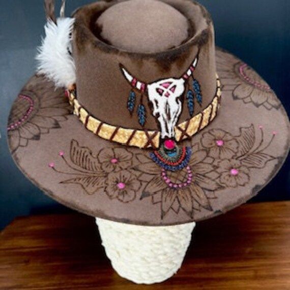 Feel Great in an amazing custom hat that has only before existed in your imagination! Be You! Receive compliments galore while wearing one of our hats. Express yourself in a truly unique hand burned and hand painted hat by Blue Printz Creationz. No one will have the same hat as you, as each hat is a unique custom work of art. Feel confident in the fact that you won't have the same hat that thousands of others have. Showcase your style and wild side. Not just a fashion statement, they are a versa Custom Flat Brim Festival Costume Hat, Custom Festival Costume Hats With Flat Brim, Custom Curved Brim Festival Costume Hat, Custom Curved Brim Costume Hat For Festivals, Custom Costume Hat With Curved Brim For Festivals, Custom Festival Costume Hat With Curved Brim, Custom Flat Brim Top Hat For Festival, Custom Wide Brim Multicolor Hat, Custom Multicolor Wide Brim Hat