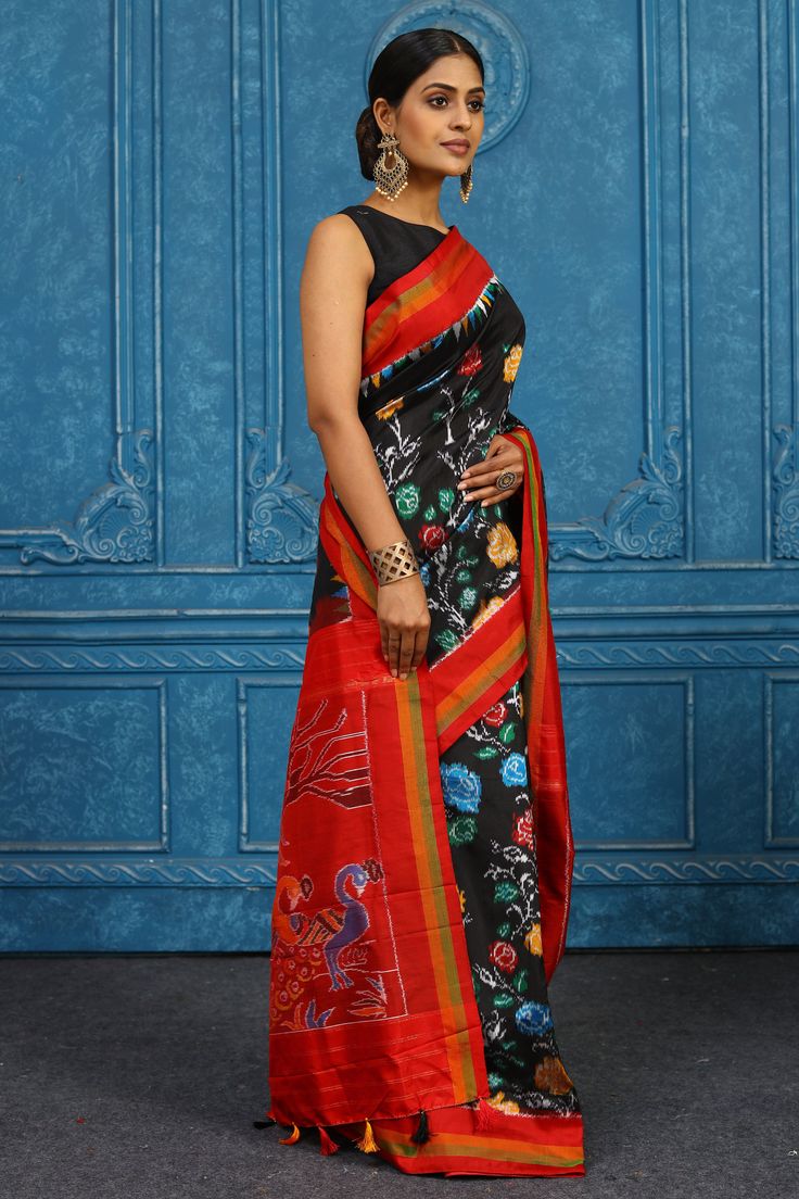 Alluring black Pochampally ikkat silk sari is a perfect drape for festive occasions. It comes with a matching blouse piece. Disclaimer: The shown stitched blouse on the model is for display purpose only. The saree comes with a matching blouse piece and finished with fall and piko. Black Pre-draped Saree With Traditional Patterns, Black Silk Handloom Pre-draped Saree, Black Bollywood Handloom Pre-draped Saree, Black Silk Pre-draped Saree With Zari Weaving, Black Pre-draped Saree With Zari Weaving For Puja, Black Chanderi Saree For Navratri, Black Silk Saree For Festivals, Black Handloom Pre-draped Saree For Festivals, Black Paithani Silk Saree