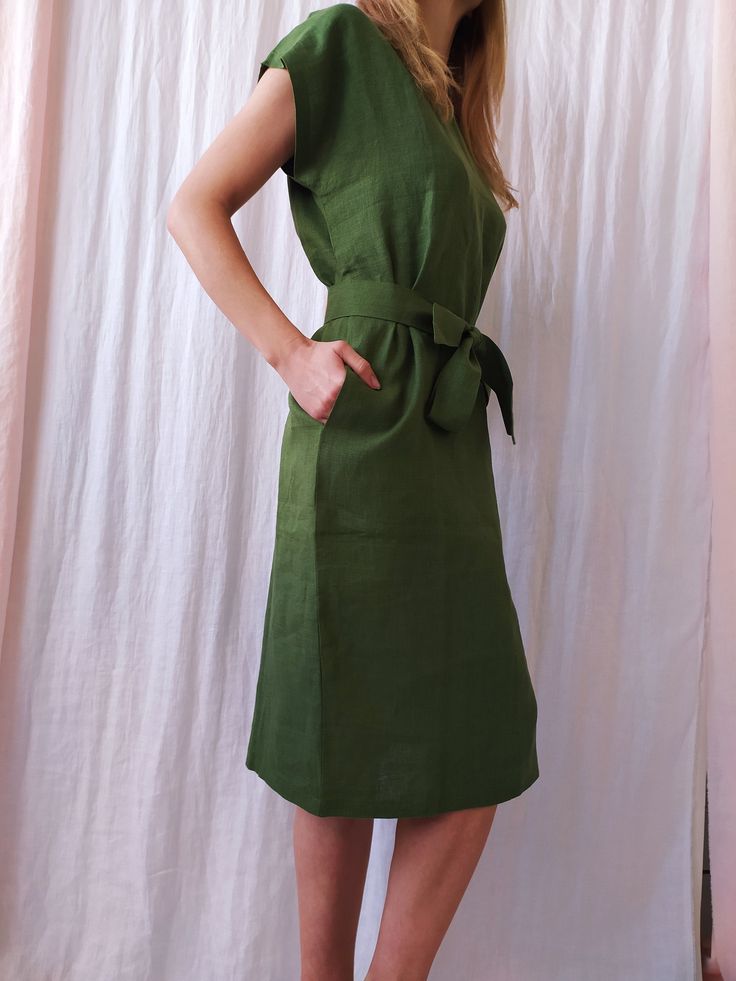 "Linen dress for women, it's elegant, minimalist, and is sure to compliment every occasion, from formal gatherings to outings with friends. Made from 100% European flax, length is ± 110 cm (43\") Before placing an order, check the approximate measurements given below. If you are unsure about your size or would like to adjust the length of the item, you could leave your personal measurements (height, bust, waist and hips) in a personalization box. SIZE and FIT Size XS Bust 85cm / Waist 66cm / Hip Solid Dress With Straight Neckline For Summer, Elegant A-line Dress With Relaxed Fit, Linen Dress For Daywear, Solid Color Linen Dress For Daywear, Plain Linen Dress For Spring, Casual Dresses With Straight Neckline For Daywear, Elegant Shift Dress With Pockets, Chic Green Relaxed Fit Dress, Chic Solid Color Linen Dress