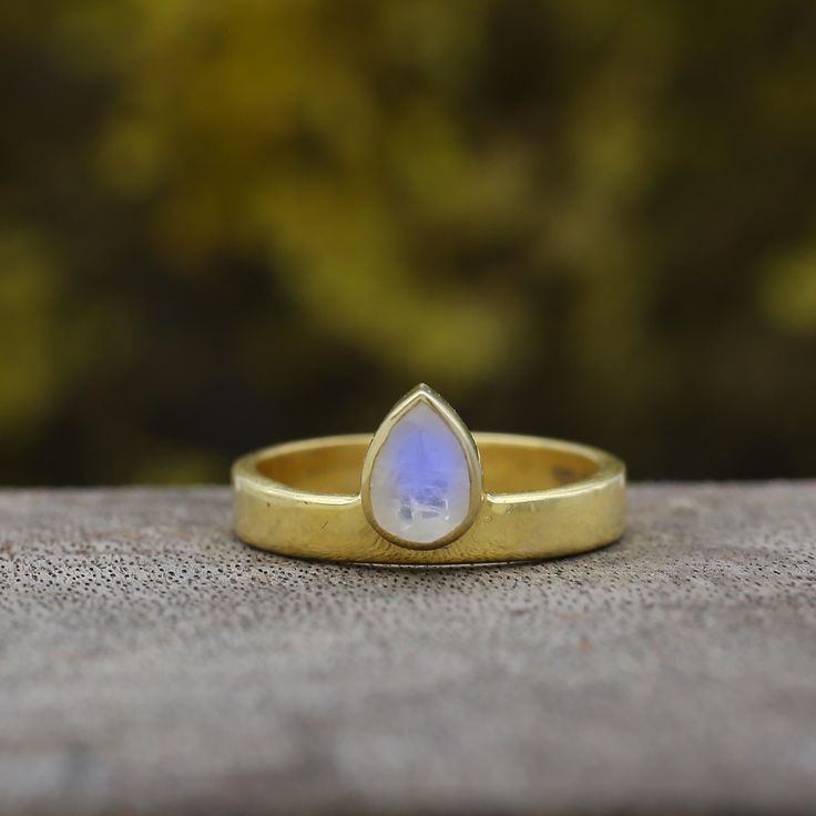 Antique Minimalist Moonstone Pear Ring- Simple Teardrop Genuine Rainbow Moonstone Ring- Stackable June Birthstone Ring- Boho Iridescent Bezel Ring ►Gemstone: Natural Moonstone ►Base Metal: 18k Rose Gold ►Gross Weight - 3 gm ★Gemstone size: ★ Stone - 7*5 mm ★ Stone Weight- approx. 1 carat ► Band measure- ★Band measurements: approx. 1.8mm wide, approx. 1.5mm thick ♥ Packaging: All jewelry comes in a beautiful and careful packaging 🛍 If the item is going directly to the gift recipient please leave Wedding Rings Pink, Wedding Ring Gold, Pink Wedding Rings, Rings Pink, June Birthstone Ring, Pear Ring, Wide Band Ring, Bezel Ring, Ring Simple