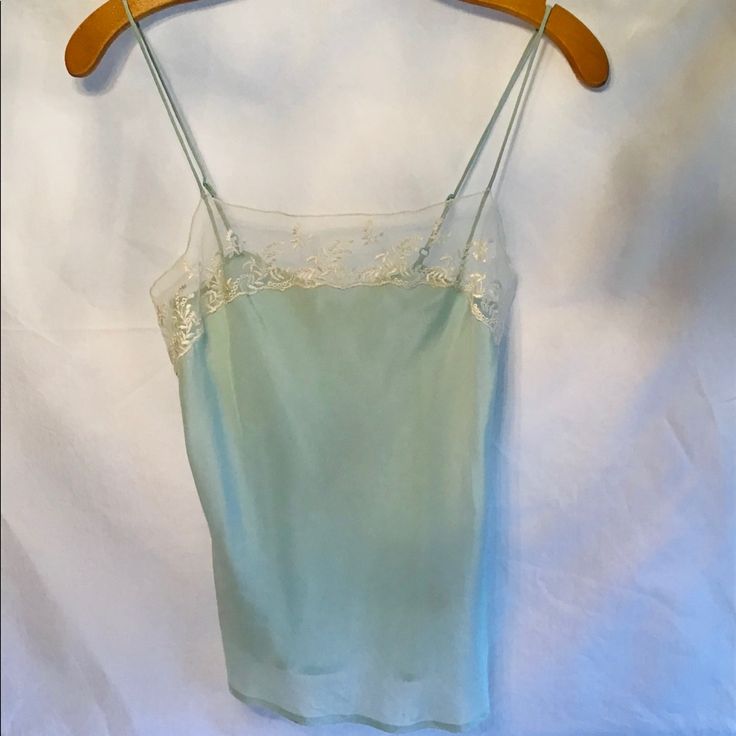 Mint Light Blue Cami Perfect Alone Or Under Sweater, Jacket, Anything. Don’t Pass This Up As Addition To Your 2020 Summer Wardrobe. Size Xs, I Am 32 D And It Fits Me Beautifully And Perfectly. So Why Are You Selling This Dixie? I’ve Had This For Many Years, Tags Attached In Closet. Too Beautiful To Hang There. Pics Give Material And All Details. Good Info To Know: Chest 29” Top To Bottom 16” Fitted Vintage Camisole For Spring, Sheer Camisole Tank Top For Spring, Vintage Spring Camisole With Spaghetti Straps, Vintage Spaghetti Strap Camisole For Spring, Spring Sheer Tank Camisole, Fitted Light Blue Camisole Tank Top, Vintage Fitted Spaghetti Strap Tops, Vintage Spring Camisole, Light Blue Fitted Cami Top