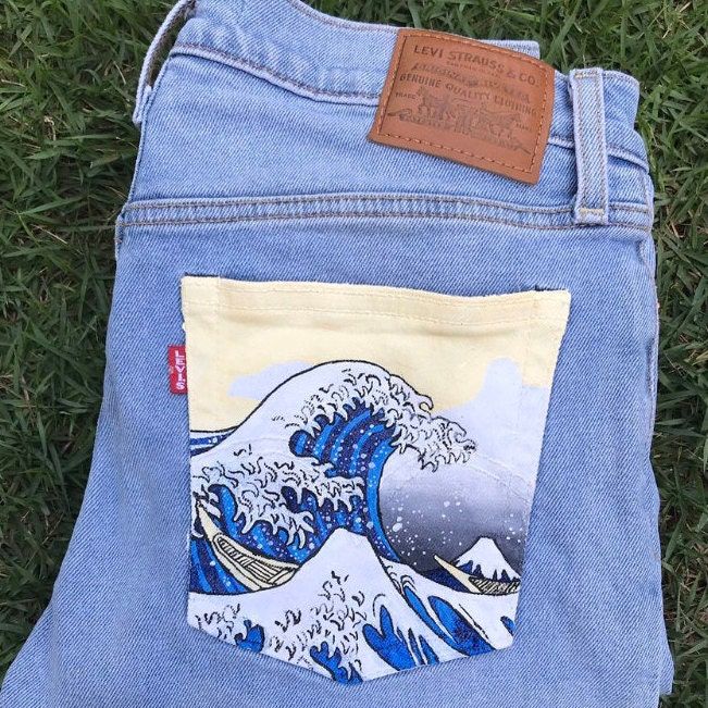 Hand painted Levi's Wedgie Straight Jeans. These are high waisted jeans with a relaxed fit- size 25. Can be washed and dried! Painted On Jeans, Denim Kunst, Jean Diy, Diy Clothes Storage, Vetements Shoes, Painted Clothes Diy, The Great Wave Off Kanagawa, Diy Jeans, Denim Art