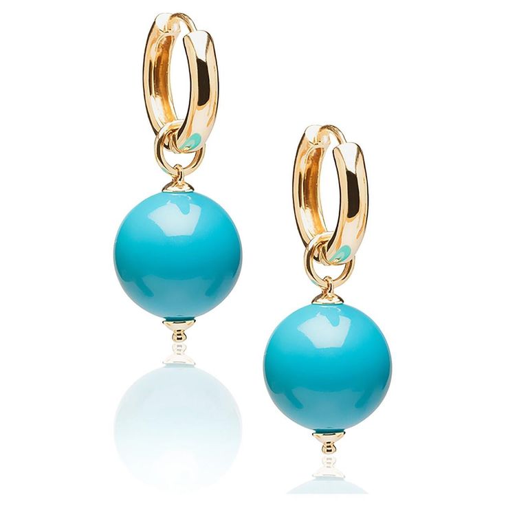 These Turquoise Plain Round Bead Double Loop Earrings in 18K Yellow Gold are an exquisite pieces from the 'Beyond' Collection. Crafted with meticulous attention to detail, these earrings feature stunning turquoise beads in lustrous 18K yellow gold loops. The combination of vibrant turquoise and luxurious gold creates a striking contrast, making these earrings a timeless and elegant addition to any jewelry collection. With their simple yet sophisticated design, they effortlessly transition from day to evening, making them a versatile and stylish accessory for any occasion. Elevate your style with these captivating earrings that embody the essence of beauty and craftsmanship. * Gemstone size: 14 mm * Gemstone: 100% Earth Mined * Approx. gemstone Weight: 35.67 Carats (Turquoise) * Cut: Bead * Bulgari Jewelry, Turquoise Bead Earrings, Loop Earrings, Antique Earrings, Lovely Jewellery, Bead Earrings, Blue Earrings, Jewelry Earrings Hoops, Turquoise Earrings