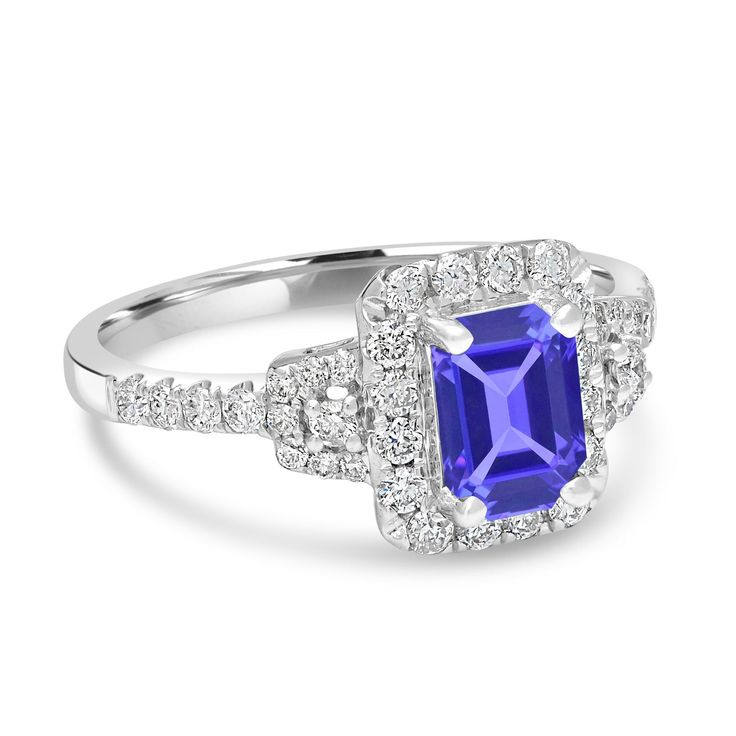 7X5mm Violetish Blue Tanzanite AAAA Ring Emerald Cut shape 1.05ct with 0.54cttw Diamond in 14K & 18K White Gold, Yellow Gold & Rose Gold Product Information SKU TT20670 Metal Type Your choice: 14K, 18K Metal Color Your choice: White Gold, Yellow Gold, Rose Gold Metal Weight 2.77 Primary Stone Gemstone Name Tanzanite Gemstone Species Zoisite No. Of Gemstones 1 Gemstone Shape Emerald Cut Gemstone Color Violetish Blue Gemstone Grade Your choice: AA, AAA, AAAA Gemstone Clarity VVS Gemstone Total Car Blue Diamond Engagement Ring, Blue Sapphire Gemstone, Sapphire Rings, Tanzanite Ring, 14k Rose Gold Ring, Tanzanite Gemstone, Blue Tanzanite, Rose Gold Metal, Blue Sapphire Rings