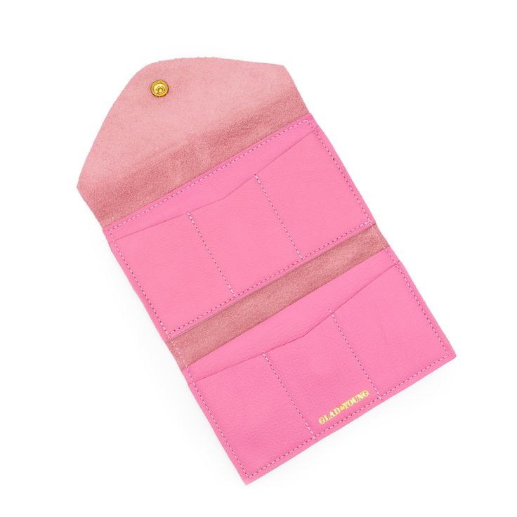 PinkTHE wallet. Functions like a dream, holds all you need, doubles as a clutch. Available in a myriad of colorful leather options, so you can choose the one that is perfectly you. This classic design features 6 credit card slots, a compartment for organizing bills and receipts, and a back zippered coin pocket— all in a slender silhouette. The sleeve of this wallet also holds your phone, so feel free to carry it solo anytime you feel like getting dressed up. Available in soft chrome tanned leath Everyday Trifold Clutch With Card Slots, Classic Pink Compact Wallet, Classic Compact Pink Wallet, Compact Pink Card Holder For Everyday Use, Daily Use Trifold Coin Purse With Card Slots, Everyday Envelope Card Holder, Compact Trifold Wallet For Everyday Use, Bifold Wallets With Card Slots For Organization, Bifold Wallets With Interior Card Slots