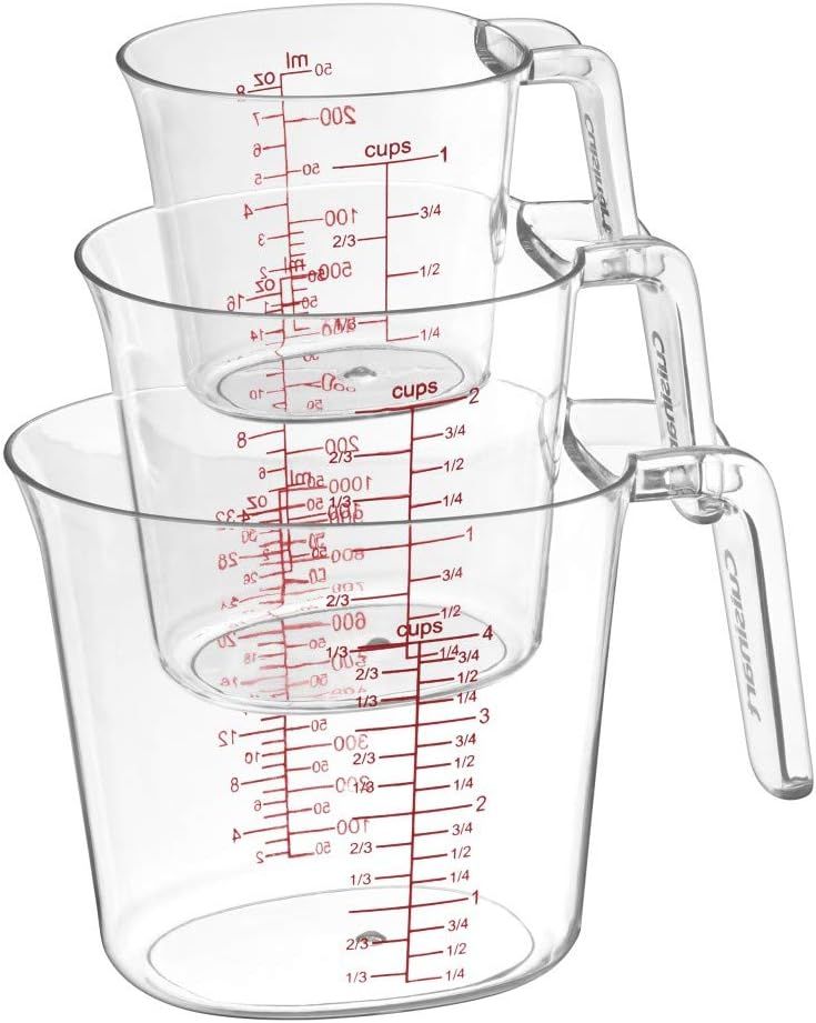 three measuring cups with handles and measurements on the sides, all in clear colored plastic