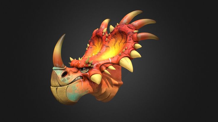 an orange and yellow dragon head on a black background